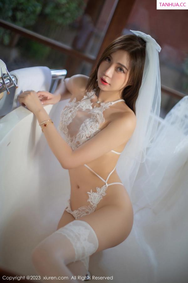 綺裡嘉 绮里嘉 [XiuRen]高清写真图 2023.09.28 No.7456 绮里嘉ula 婚纱美腿第43张图片